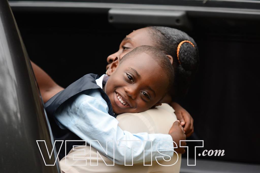 Father and son sharing a joyful hug